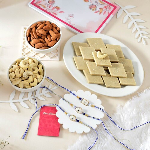 Buy Elegant Evil Eye Rakhi Set with Dryfruits and Kaju katli