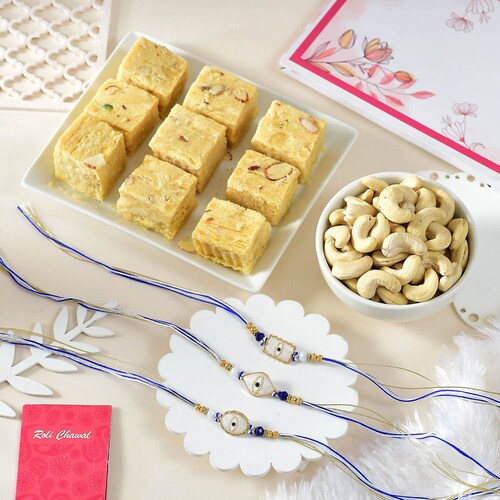 Buy Elegant Evil Eye Rakhi Set with Soan Papdi and Cashew