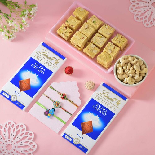 Buy Set of Three Enchanting Rakhi and Gourmet Hamper