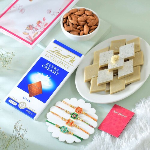 Buy Set of Four Alluring Rakhi with Gourmet Hamper