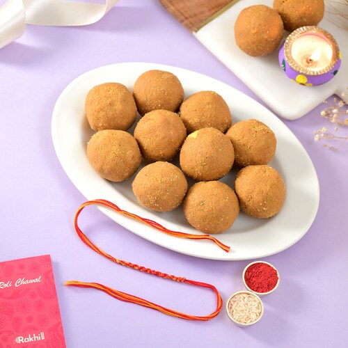 Buy Thread Rakhi with Besan Laddoo