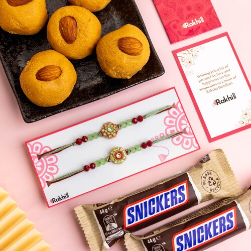 Buy Set of 2 Rakhi with Besan Laddoo and Snickers Chocolate
