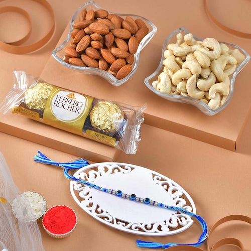 Buy Blue Evil Eye Rakhi with Chocolate and Dryfruits Gift