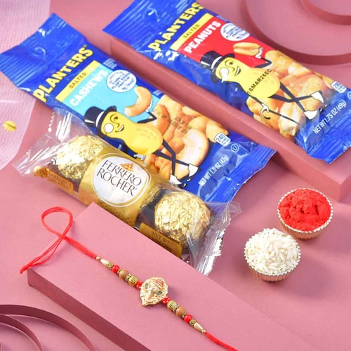 Buy Elegance Ganisha Rakhi with Chocolate and Dryfruits