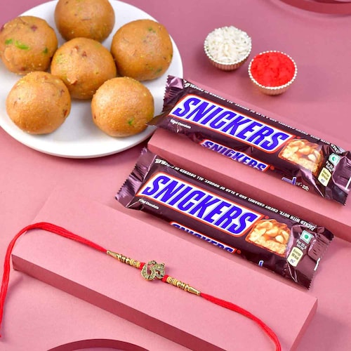 Buy Royal Big Om Rakhi with Chocolate and Sweets