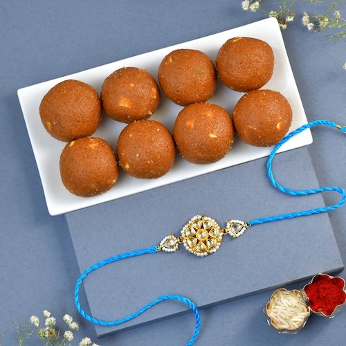 Buy Heritage Round Rakhi with Sweets
