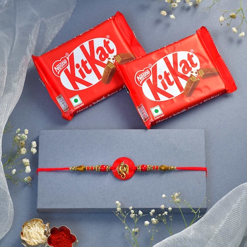 Buy Red Ganisha Rakhi with Kitkat
