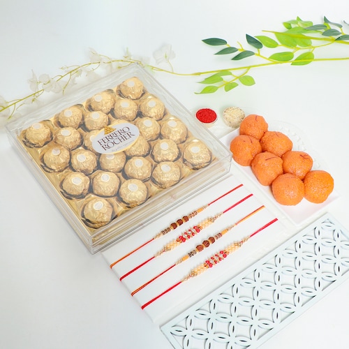 Buy Set of 4 Rakhi with Ferrero Rocher and Motichoor Laddoo