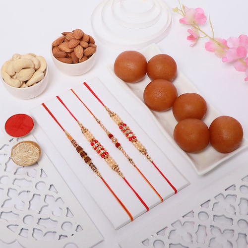 Buy Set of 4 Rakhi with Gulab Jamun and Dry Fruit
