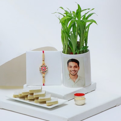 Rakhi with Sweetness of Kaju Katli and Lucky Bamboo