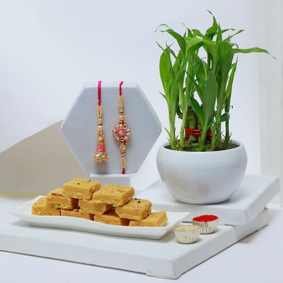 Rakhi with Sweetness of Soan Papdi and Lucky Bamboo