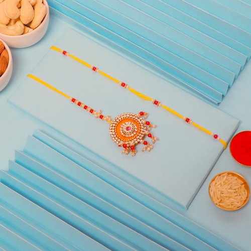 Buy Bhaiya Bhabhi Rakhi Set with Almond and Cashew