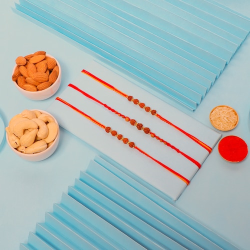 Buy Set of 3 Rudraksh Rakhis with Almond and Cashew