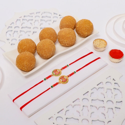 Buy Set of 2 Rakhi with Besan Laddoo