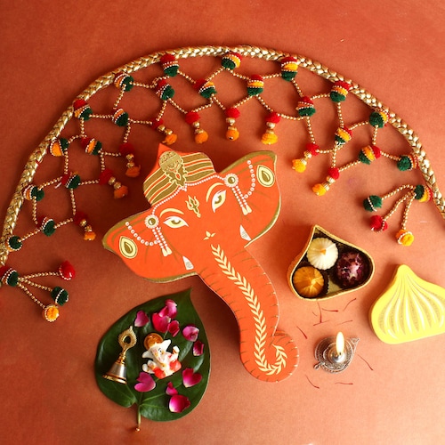 Buy Ganesha Box With Handmade Toran and Assorted Modak