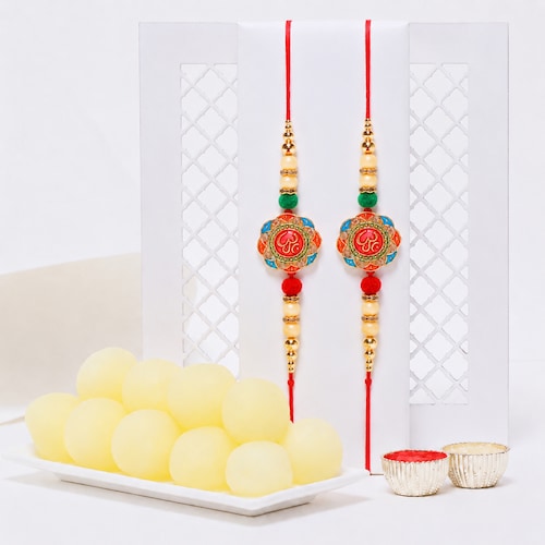Buy Set of 2 Designer Om Rakhis with Rasgullas