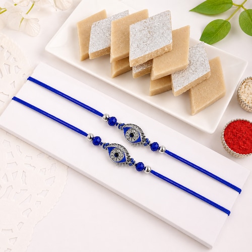 Buy Set of 2 Evil Eye Rakhis with Kaju Katli