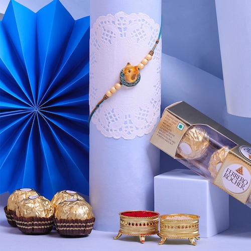 Buy Designer Ganesha Rakhi with Small Ferrero Rocher Chocolates