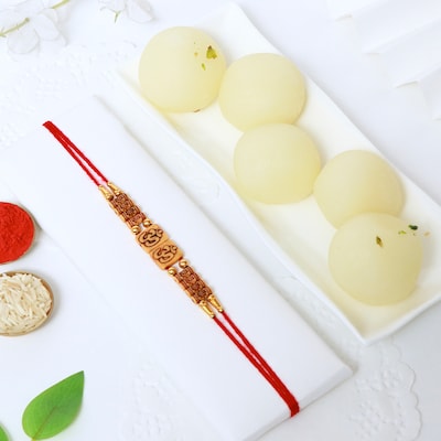 Om Rakhi with Rasgulla Delights