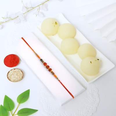 112250_Single Rudraksh Rakhi N Rasgulla 1 Kg